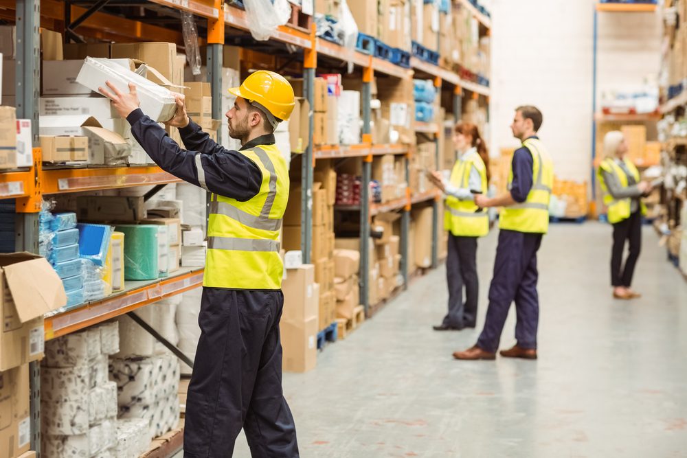 Laborers in a warehouse.